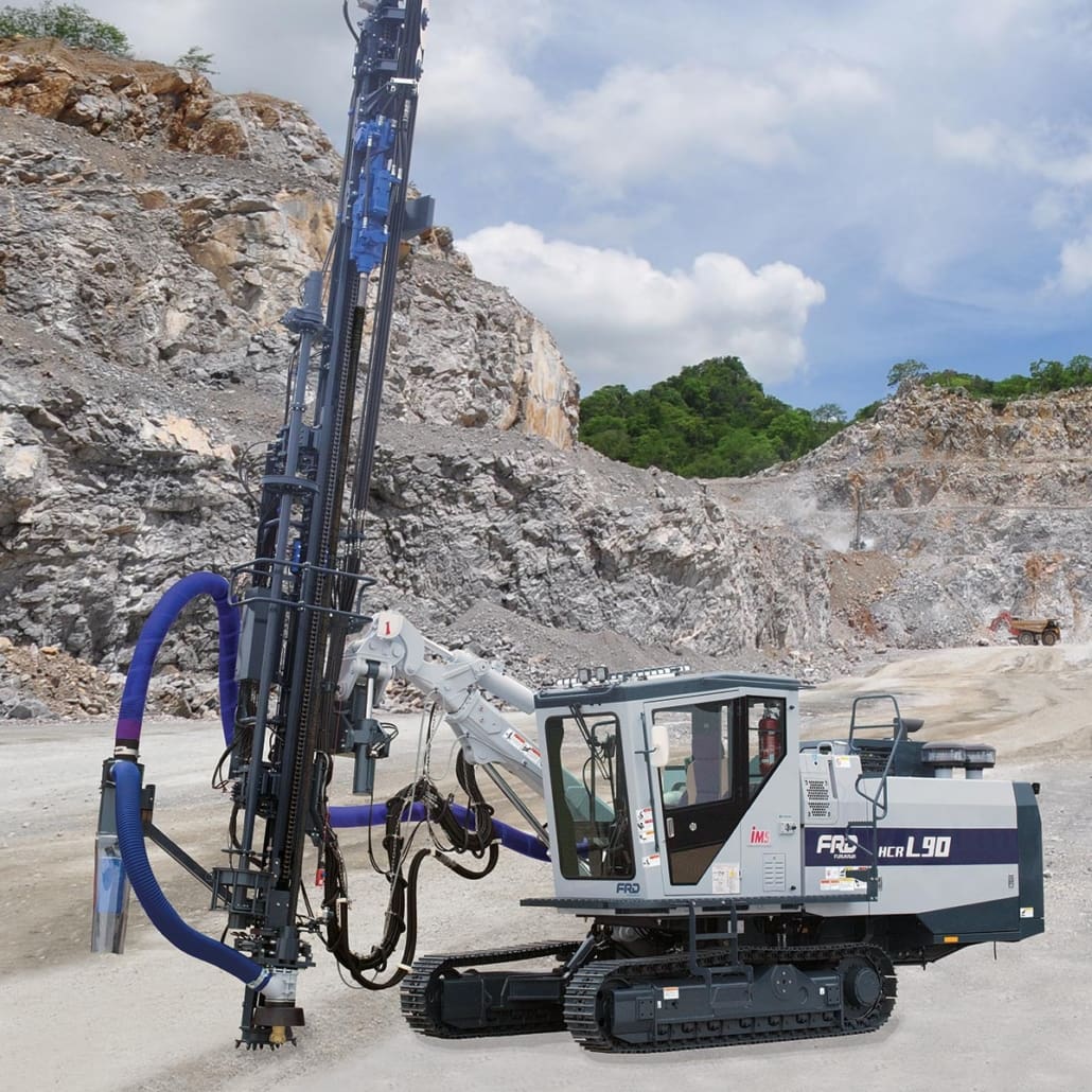 The HCRL90-E5, from Furukawa FRD with an extendable boom, incorporates a self-adjusting drill system that automatically controls the impact, feed, & rotation force to adapt to the various rock conditions.